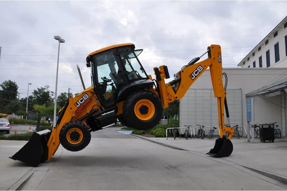 Backhoe loader Extending dipper — photo of a JCB 3CX Extradig