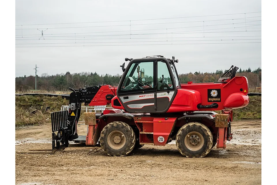 Rotating telehandler 18 m — photo of a Manitou MRT1840 Easy