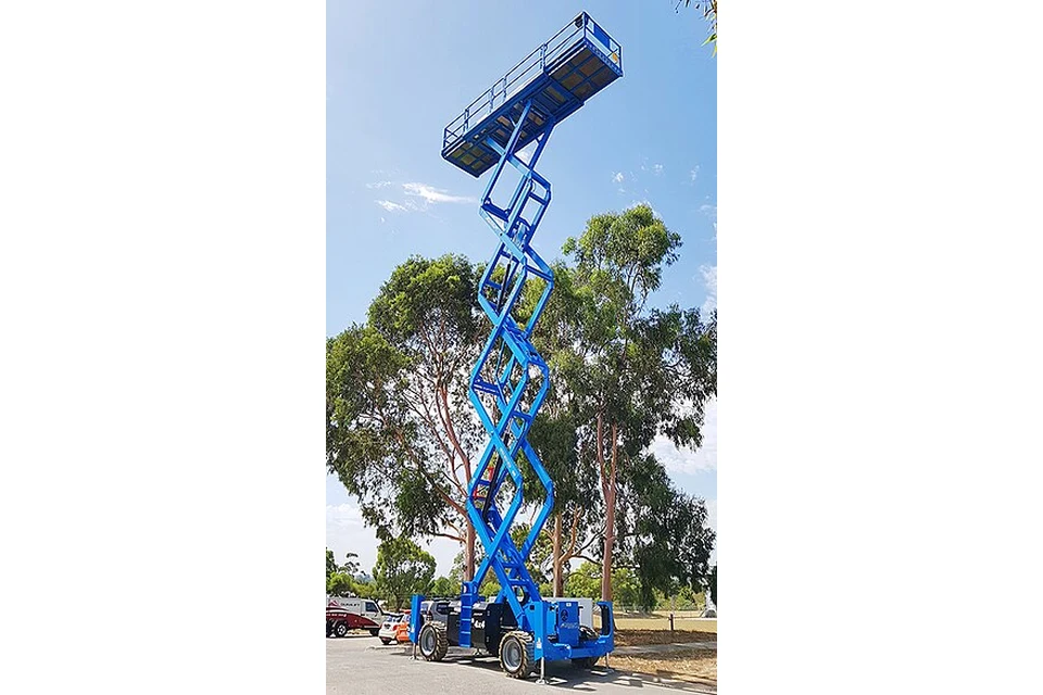 Rough terrain scissor lift 18 m (53 ft) — photo of a Genie GS-5390 RT