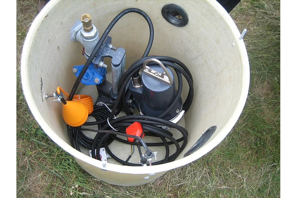 Submersible pump Grinder — photo of a Grinder pump in a collection sump