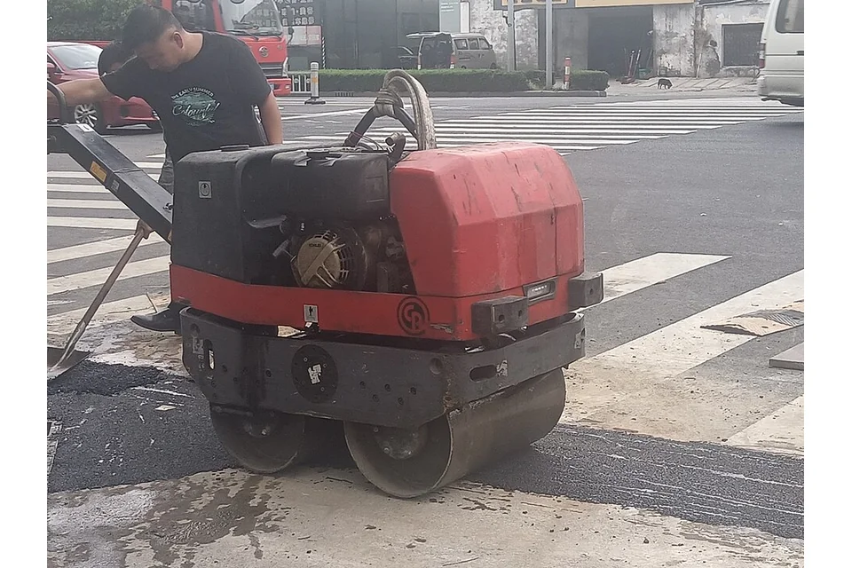 Pedestrian roller, example machine
